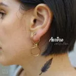 Endless Shine σκουλαρίκια από ατσάλι με γάντζο, σχέδιο άπειρου στριφτού, χρυσό BF02.00025