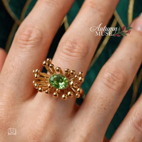 Χρυσό ατσάλινο δαχτυλίδι Verdant Bloom Ring με σχέδιο άνθους και οβάλ ανοιχτοπράσινη πέτρα