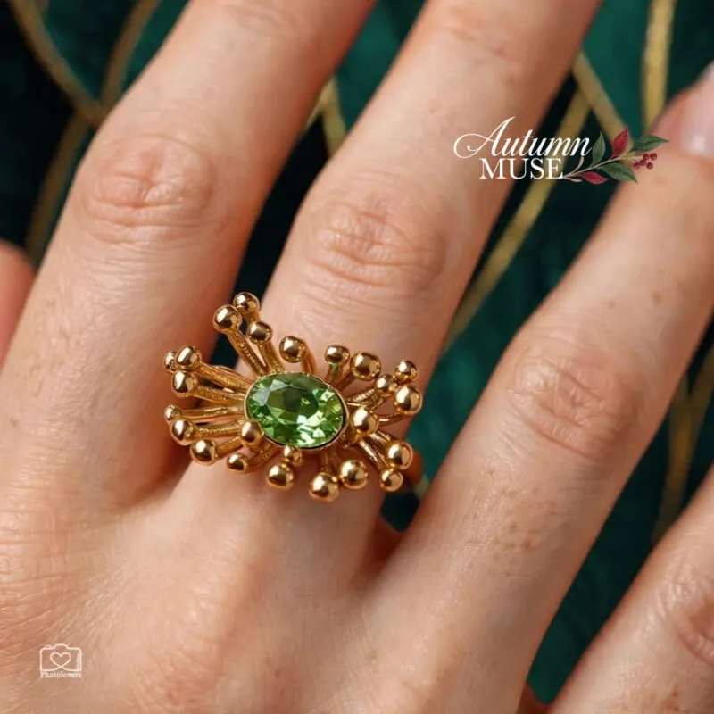 Χρυσό ατσάλινο δαχτυλίδι Verdant Bloom Ring με σχέδιο άνθους και οβάλ ανοιχτοπράσινη πέτρα